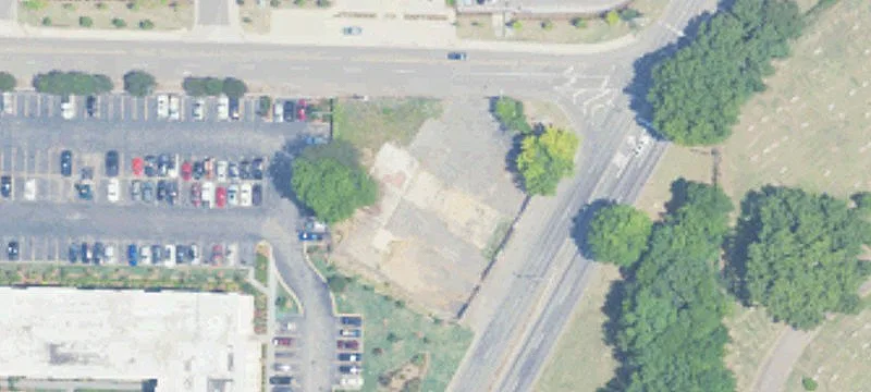Fenced Airport-Adjacent Parking Land