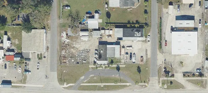 Fenced Auto Lot with Two Buildings