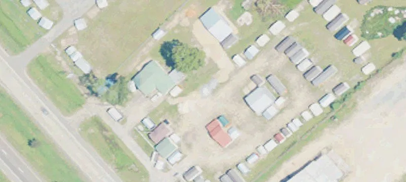 Commercial Land with Industrial Buildings
