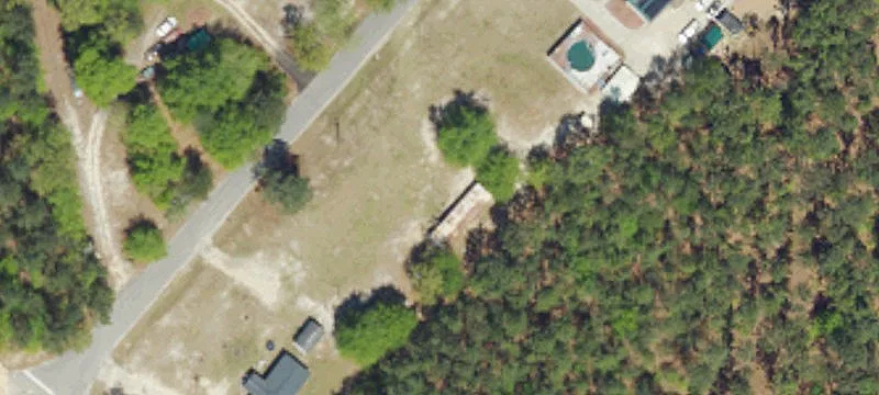 Mostly Wooded Residential Acreage