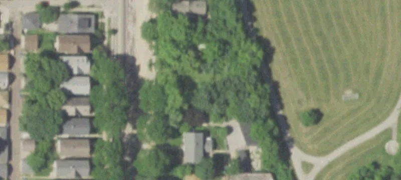 Park-Backing Residential Development Land