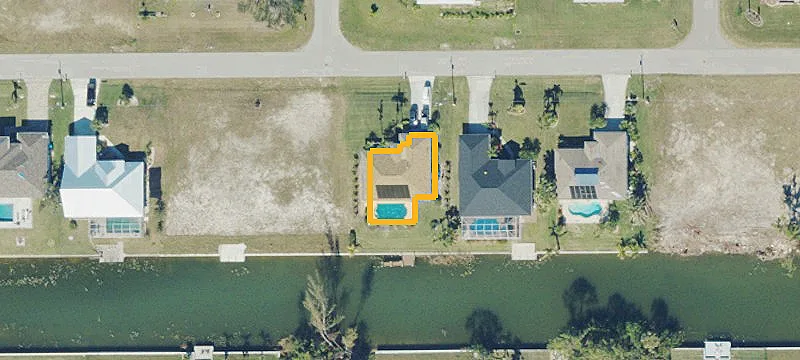 Gulf-Access Canal Lot with Seawall