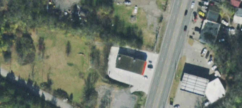 Commercial Redevelopment Land with Building
