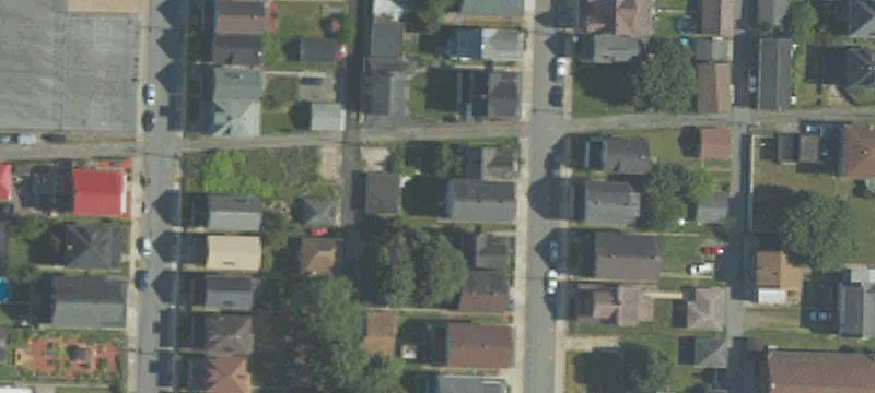 Vacant Duplex with Two Garages