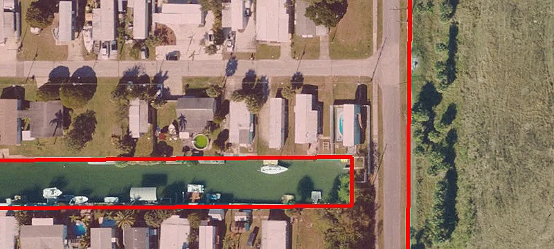 Canal-Front Waterfront Land with Dock