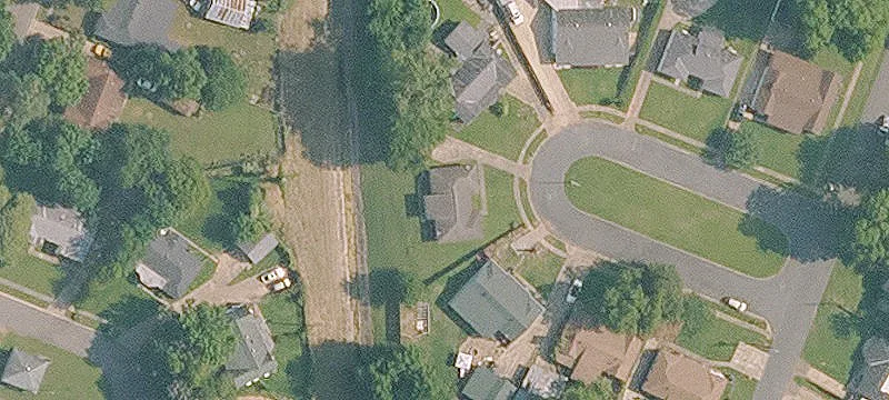 Occupied Triplex with Carports