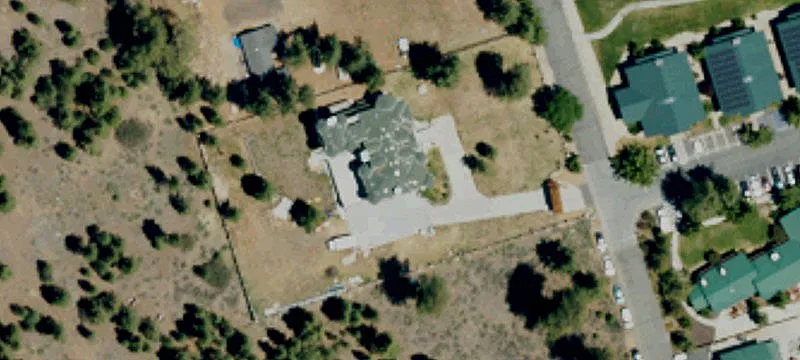 Treed Lot With Mountain Views
