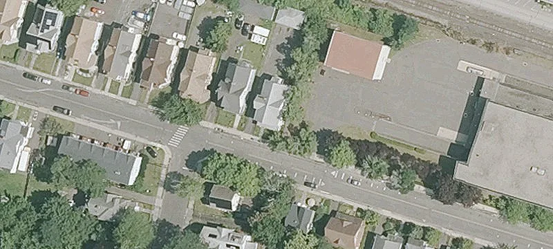 Three-Family Residence with Garages