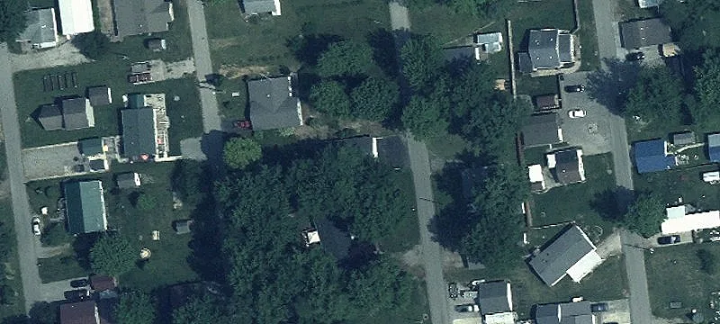 Land With Garage and Two Lots