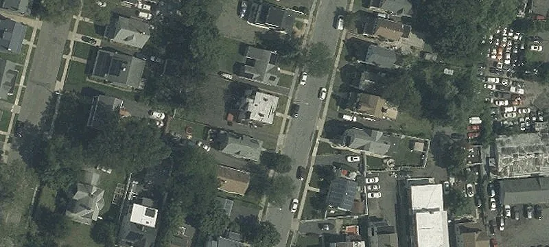Fire-Damaged Triplex with Parking