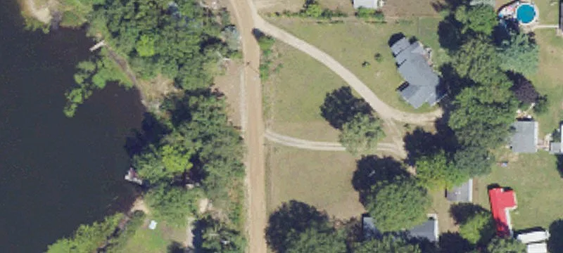 Lake-Adjacent Residential Lot with Pole Barn