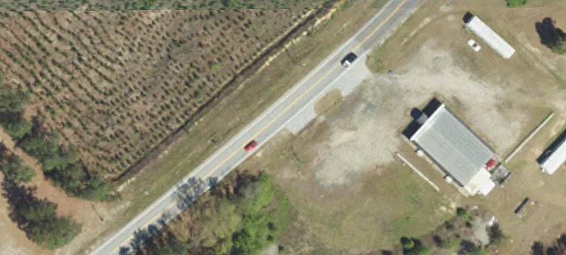 Open Farmland with Dual Road Access