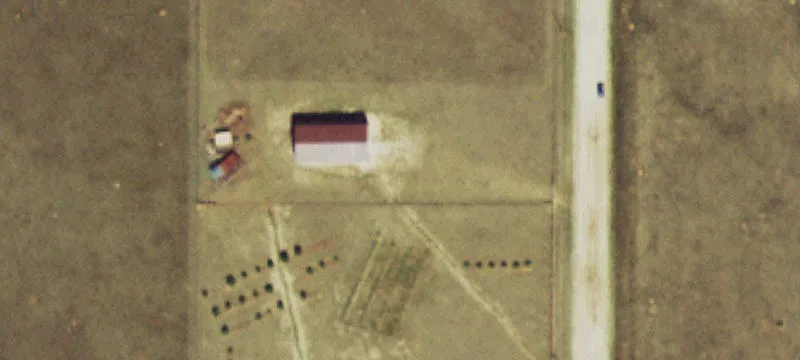 Corner Lot with Metal Building