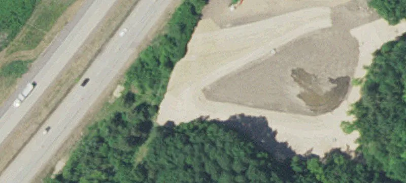 Wooded Bluff Land with Pole Shed