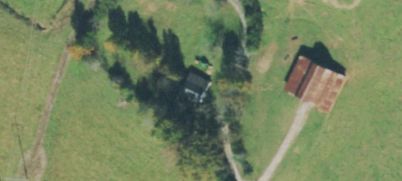 Fenced Farm Land with Barns