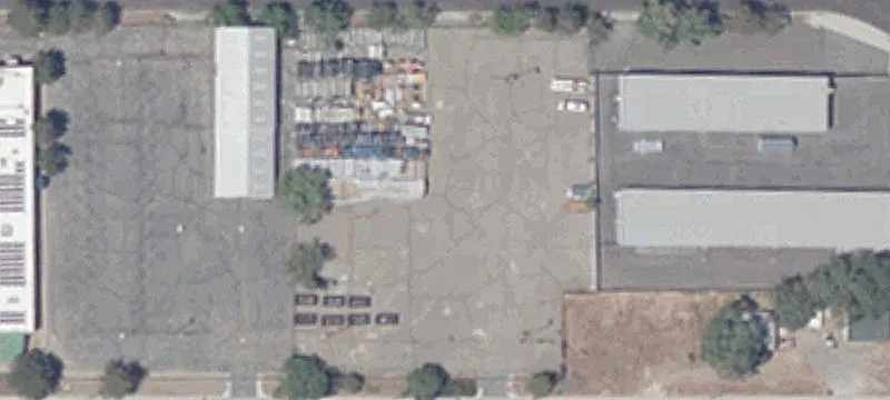 Fenced Paved Development Land