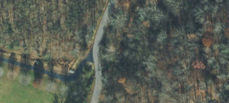 Wooded Waterfront Hilltop Land
