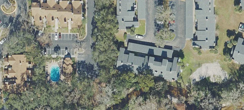 Corner-Unit Condo with 1 Carport