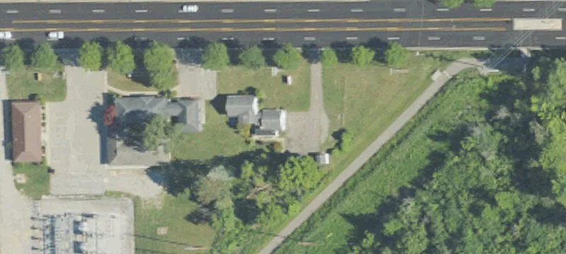 Zoned Office Building with Storage Sheds