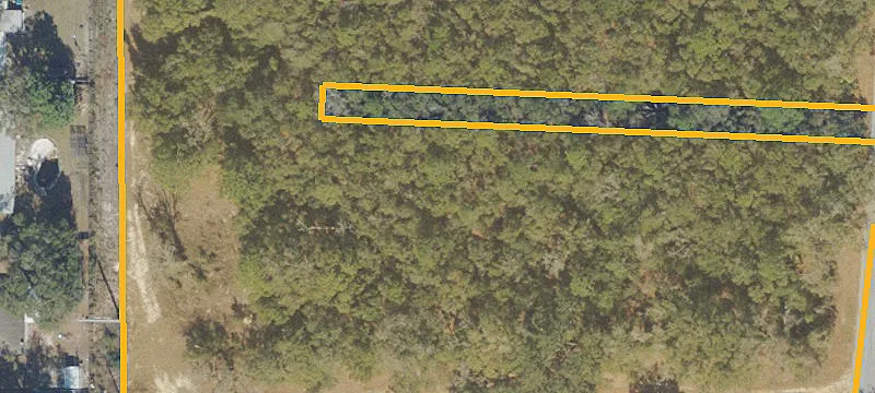 Wooded Land Parcel with Road Frontage