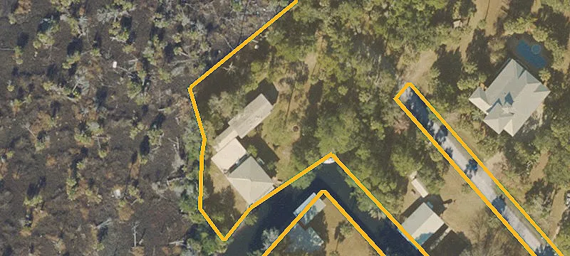 Fenced Canal-Front Buildable Land