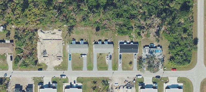 Two-Unit Duplex with Storage Sheds