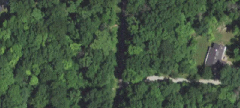 Acreage Buildable Lot in Subdivision