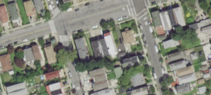 Two-Family Brick Home with Vacant Lot