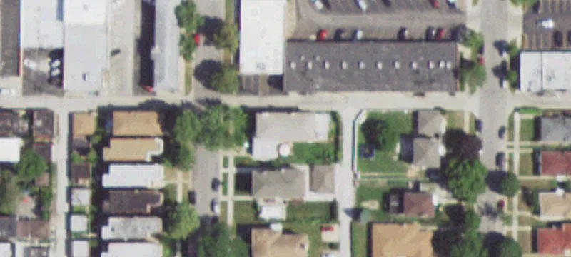 Updated Triplex with Attached Garages