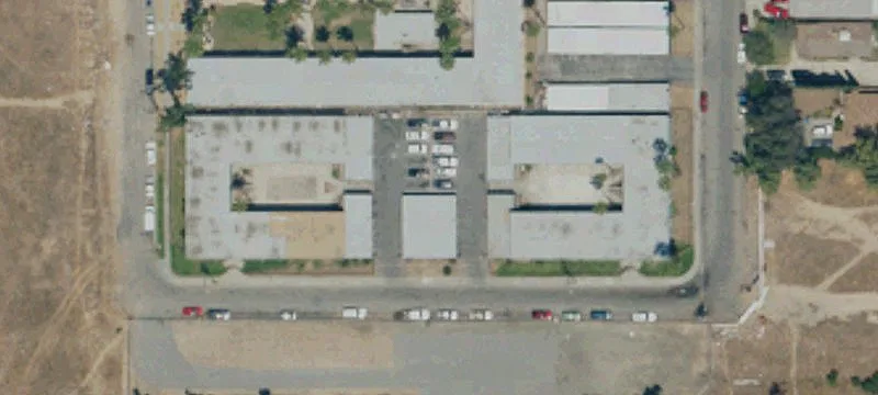 Gated Apartment Building with Carports