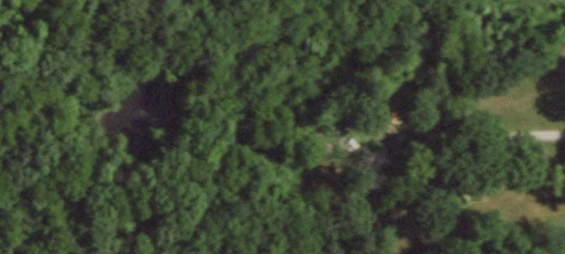 Partially Wooded Land with Pond