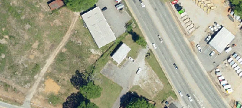 Commercial Land with Convenience Store Buildings