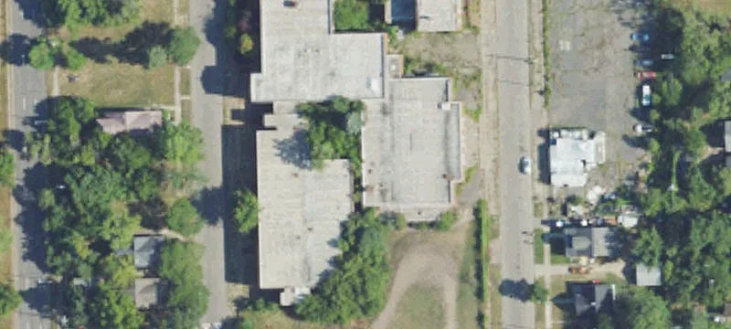 Redevelopment Land with Renovation-Worthy Building