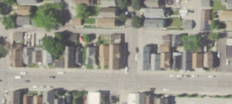 Mixed-Use Brick Building with Garages