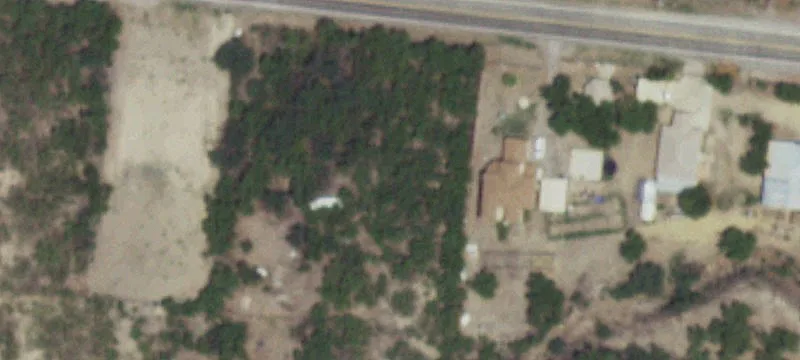 Wooded Acreage with Livestock Pen