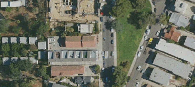Owner-Occupied Front House & 4 Units