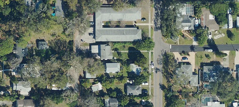 Two-Story Duplex with 4-Car Carport
