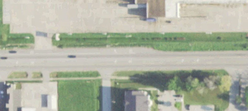 Unrestricted Land with Two Curb Cuts
