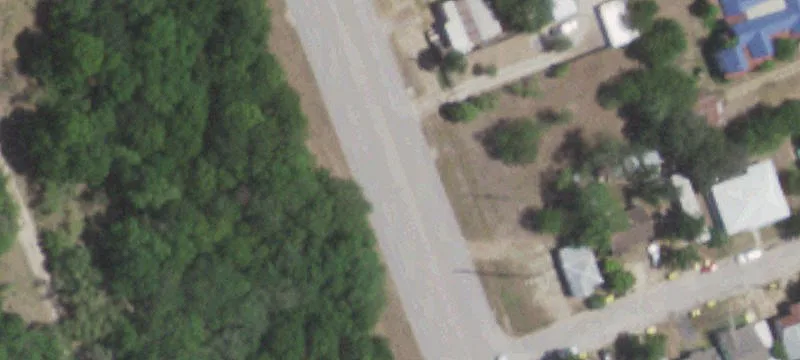 Wooded City Lot on US Highway