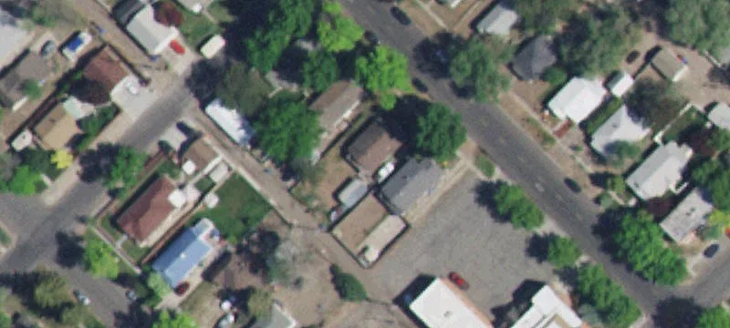 Corner-Lot Triplex With Garages