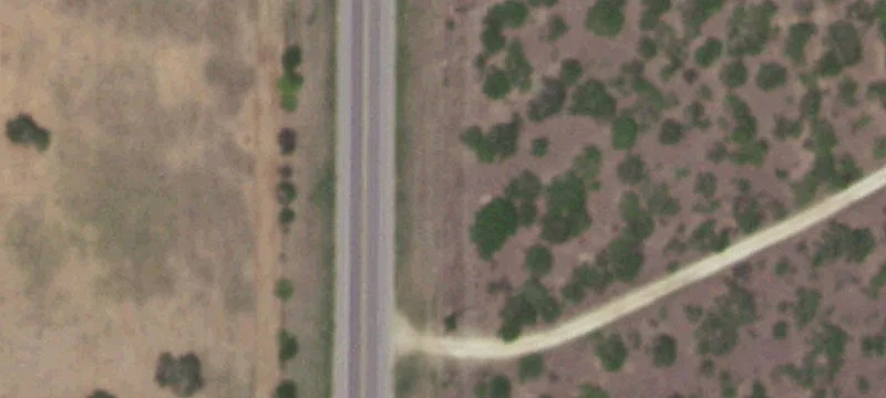 Fenced Highway-Front Land Tract