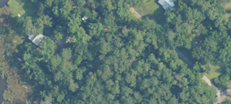 Waterfront Land with Small House