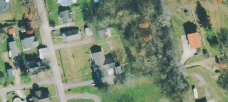 Dual-Income Duplex with Vacant Lot