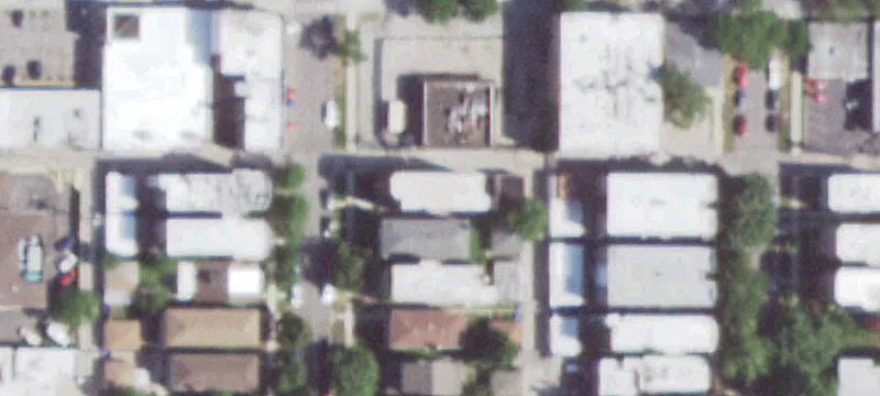 Well-Maintained Triplex with Oversized Lot