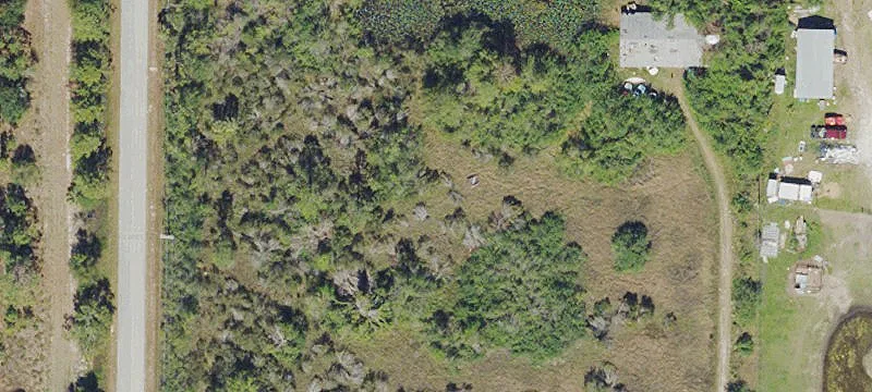 Wooded Corner Acreage with AG Zoning