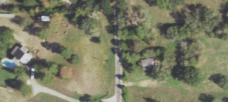 Partially Wooded Land with Pond