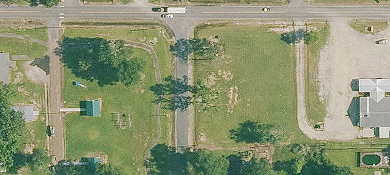 Fenced Vacant Residential Lot