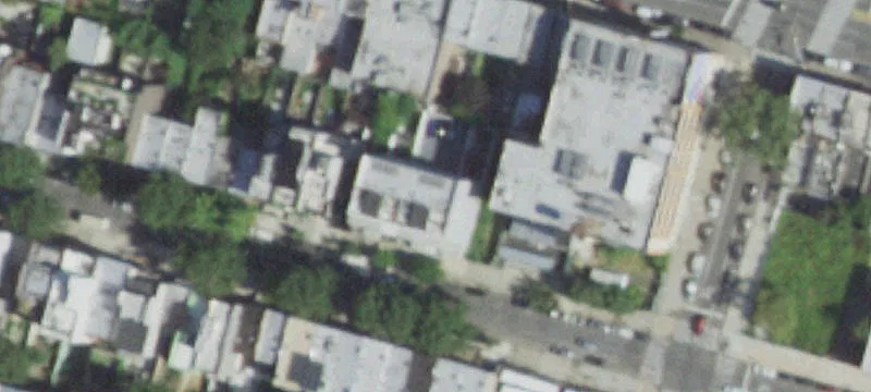 Vacant Three-Family Brick Townhouse