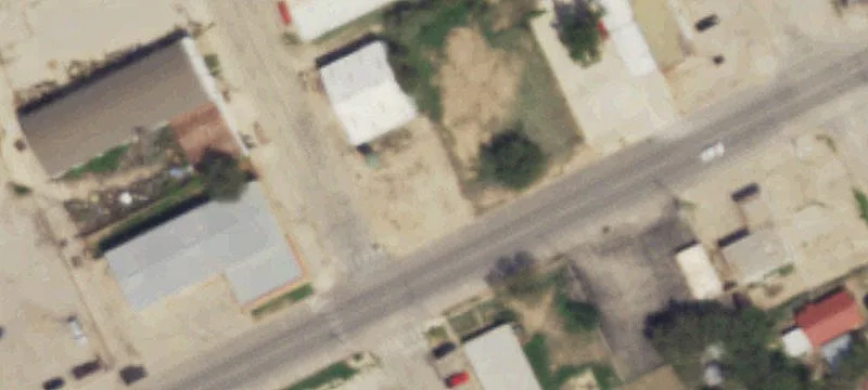 Fenced Vacant Commercial Lot