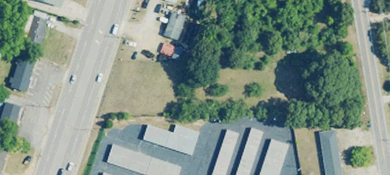 Fenced Commercial Land Lot